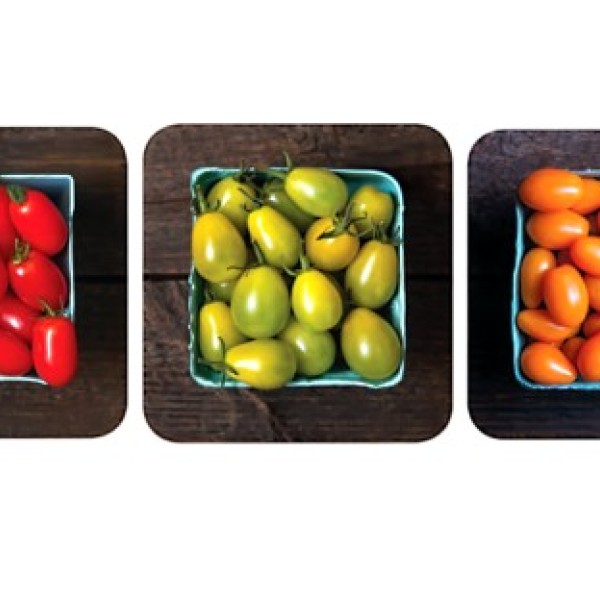 Three bowls of cherry tomatoes in red, green and orange colors